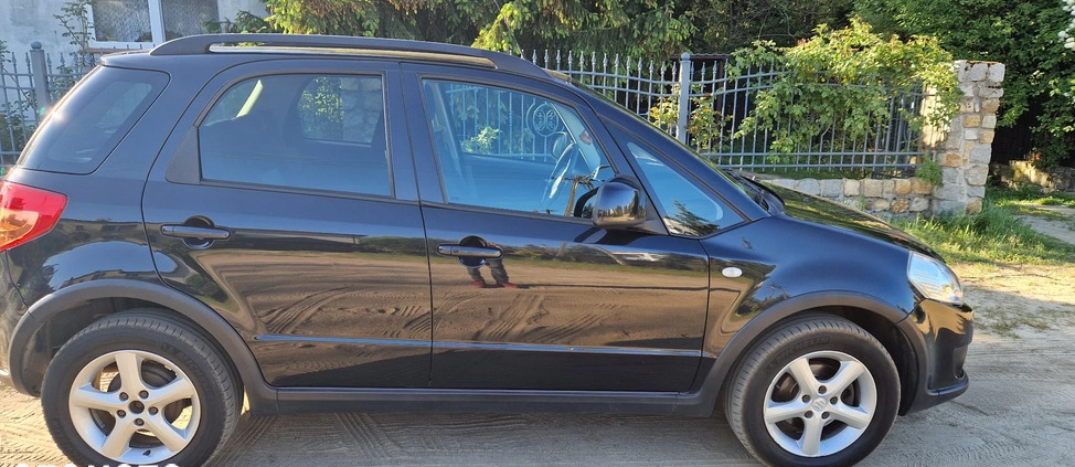 Suzuki SX4 cena 21000 przebieg: 199500, rok produkcji 2009 z Strumień małe 92